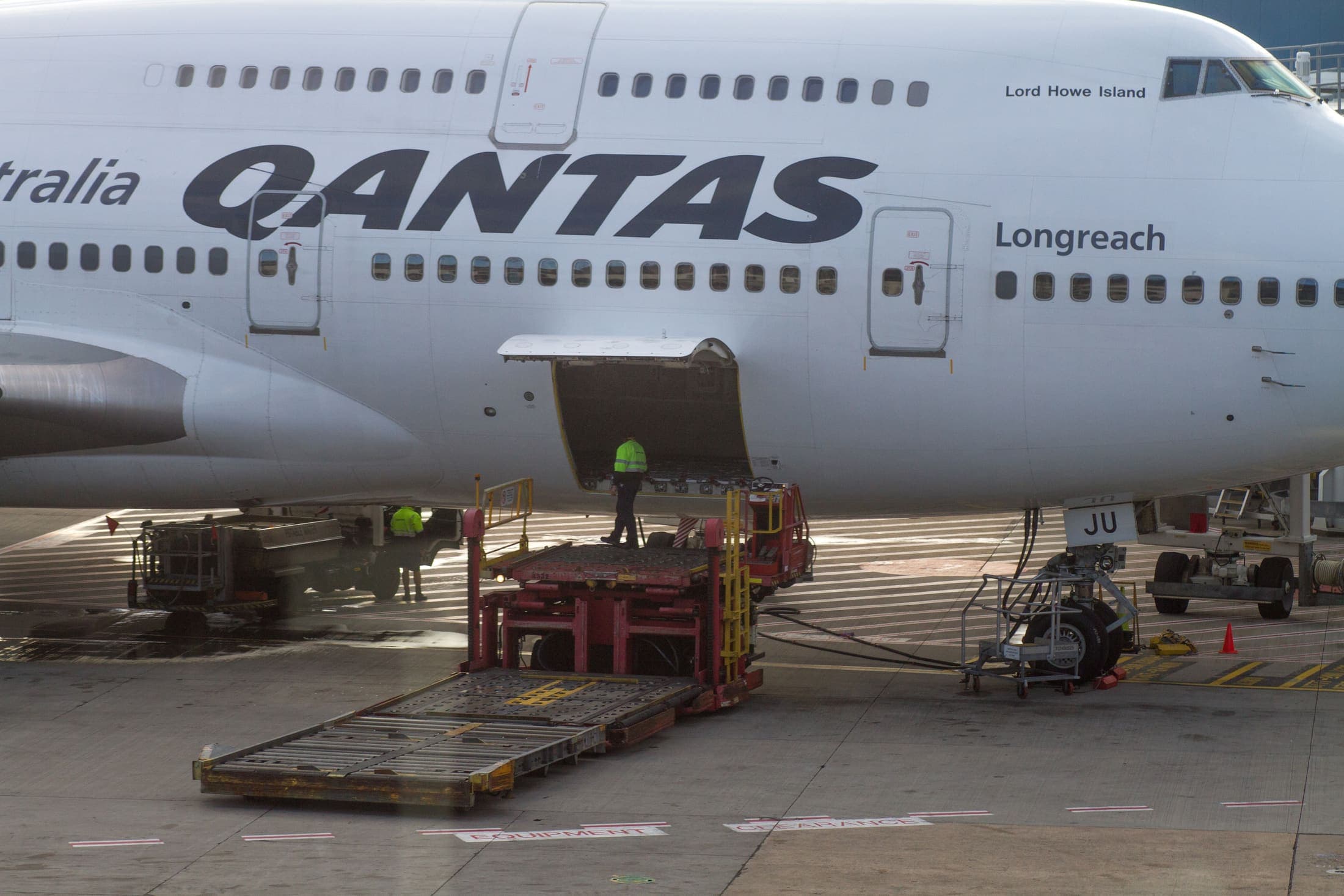 Containers being loaded into a cargo aircraft